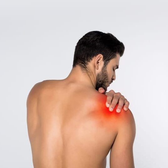 man with shoulder joint pain in need of treatment